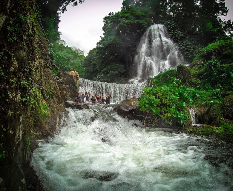 Sao Miguel: Caldeiroes Canyoning Experience - The canyon action: optional jumps, a natural slide, and abseils