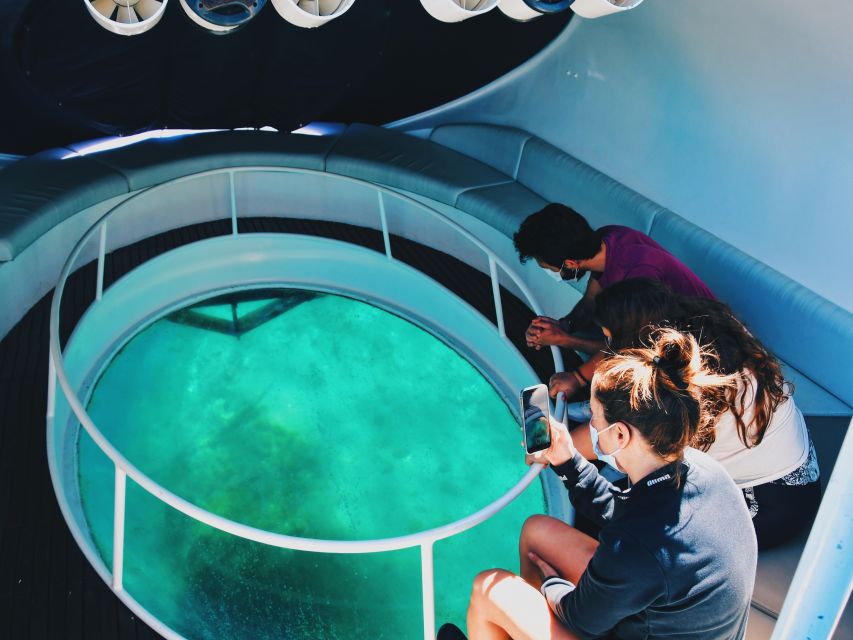 São Miguel: Glass Bottom Boat Tour with Snorkeling - Getting there at Vila Franca do Campo Marina, and what the crew does first