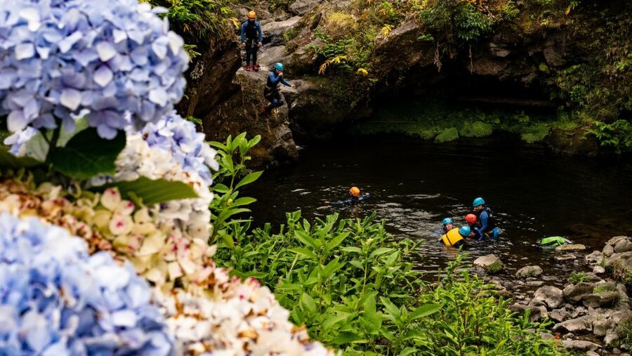 Sao Miguel: Ribeira dos Caldeiroes Canyoning Experience - Guided canyoning: waterfalls, abseils, and the 8 meter moment